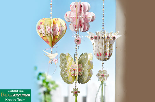 Edler Fensterschmuck mit Design-Papieren und Schmucksteinen
