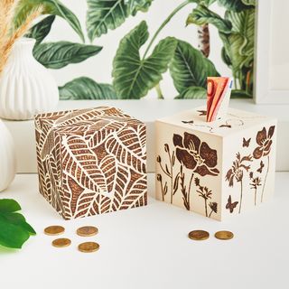 Money box cube with wooden burning
