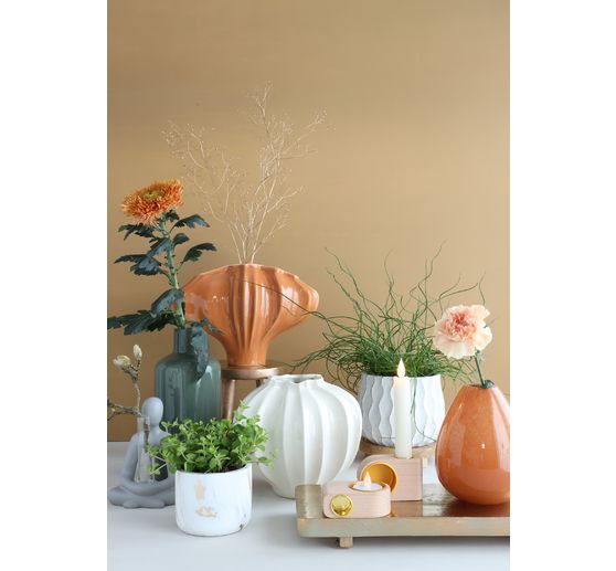 Candle holder for stick candles and tea lights