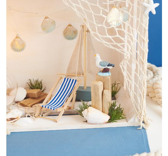 Muschelgirlande mit Perlen