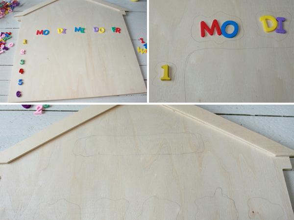 Die Tafelfarbe auf das Holz malen